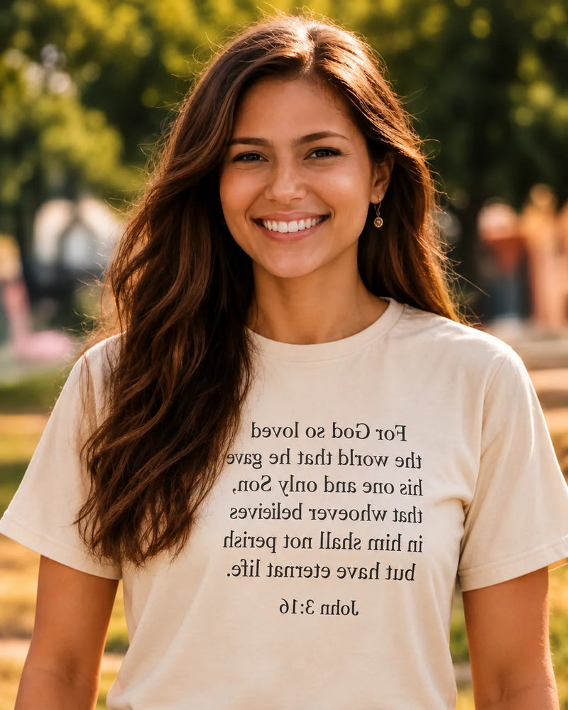 Customer wearing a Mirror Scripture tee